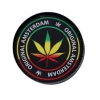 Grinder Młynek do Tytoniu „Original Amsterdam” – rasta liść na czarnym tle