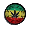 Grinder Młynek do Tytoniu „Original Amsterdam” – liść na tle barw rasta